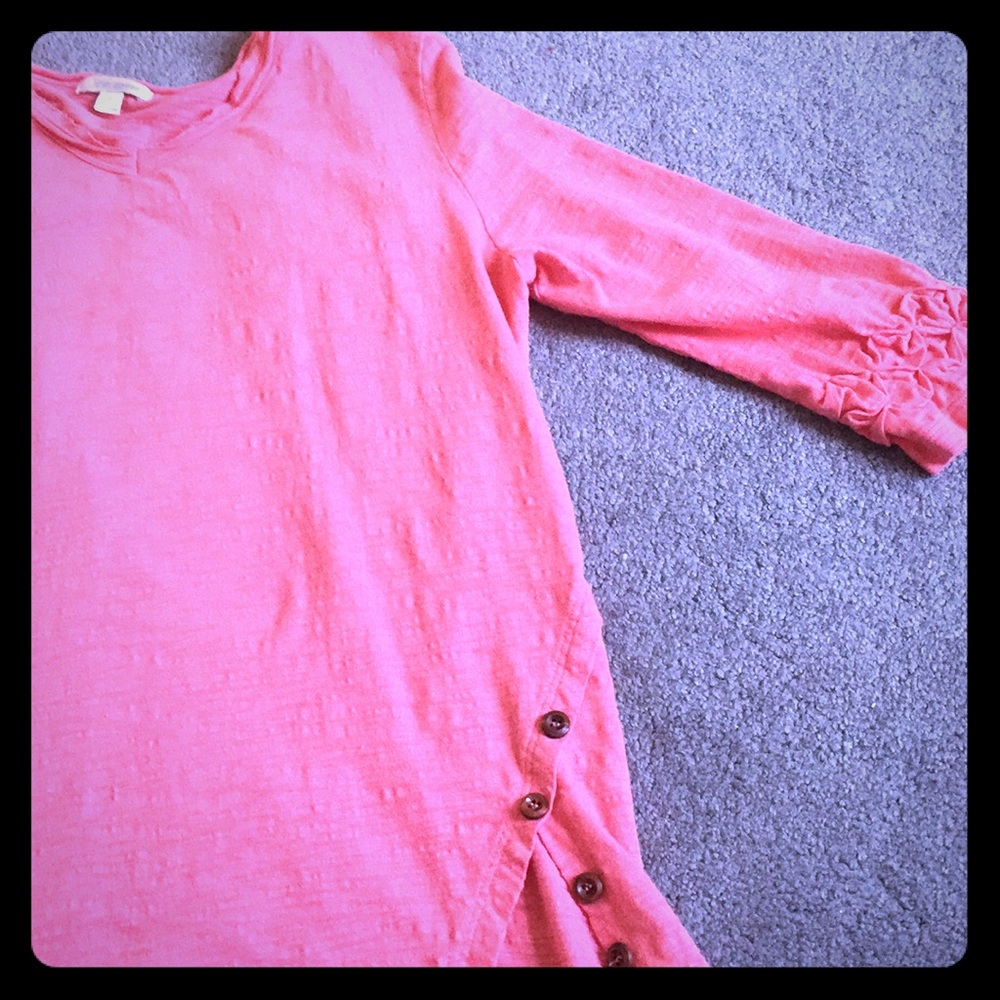 A pink 3 quarter length sleeve